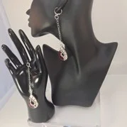 Red and white dangle earrings