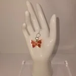 Red glitter butterfly necklace piece